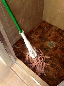Use a mop to clean your shower